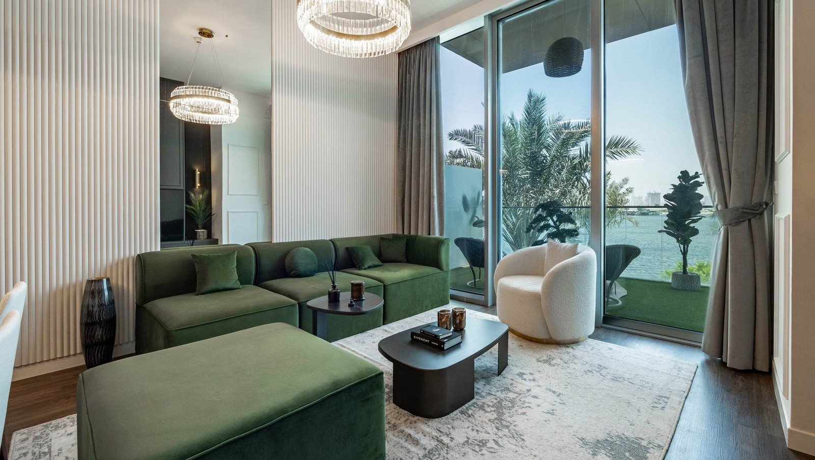Living room with canal view, The Grand 3 bedroom townhouse