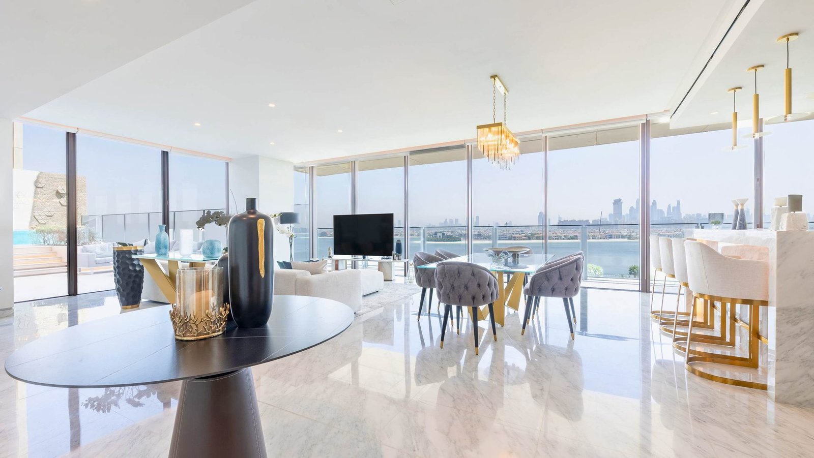 Living and dining room with Palm view, The Royal Atlantis 3 bedroom sky court Living and dining room with Palm view, The Royal Atlantis 3 bedroom sky court